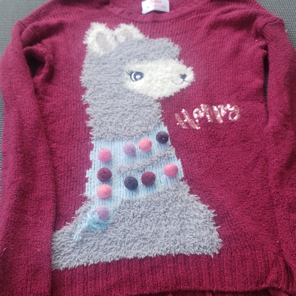 Justice sweater
